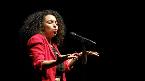 Woman performing poetry