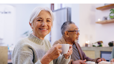 Two people having a cup of coffee together