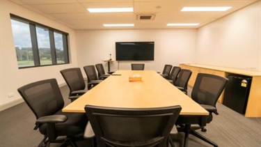 Boardroom - a boardroom style table with 10 executive chairs