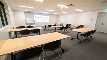 Function room - classroom style seating arrangement.