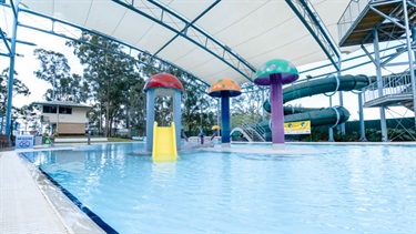 Leisure swimming area junior slide and mushrooms