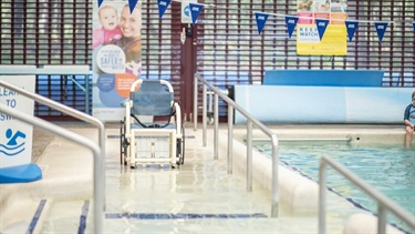 Indoor heated program swimming pool ramp access