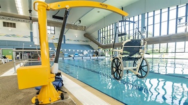 Indoor heated program swimming pool hoist