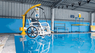 Indoor heated program swimming pool hoist