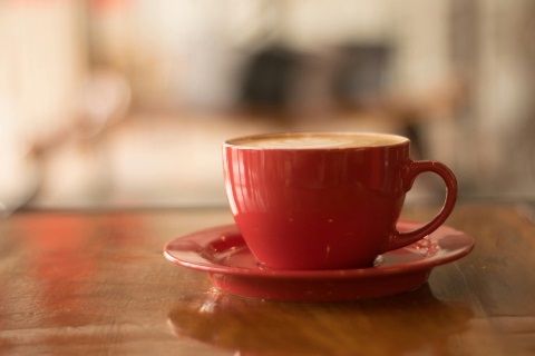 Image of a red cup and saucer