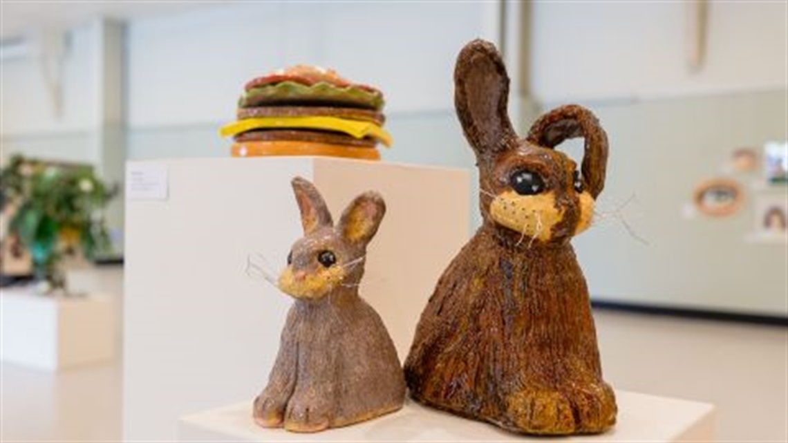 Two rabbit clay sculptures