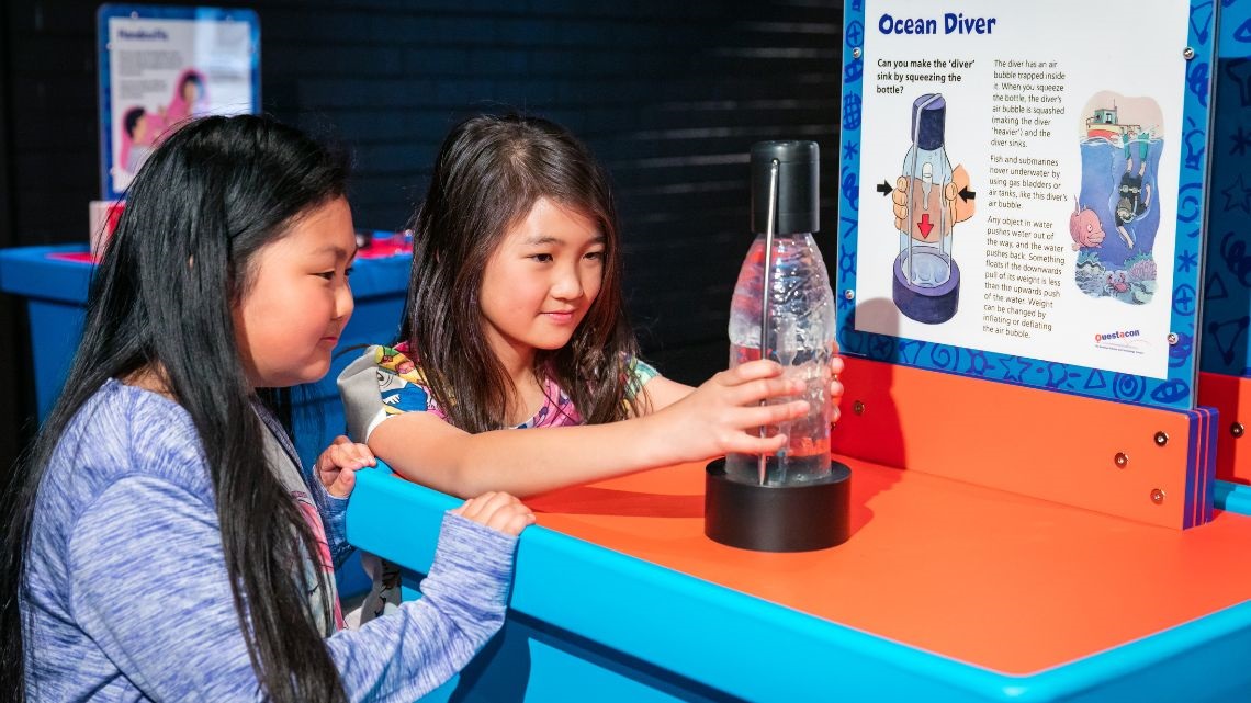 Two children interacting with an exhibit - Ocean Diver