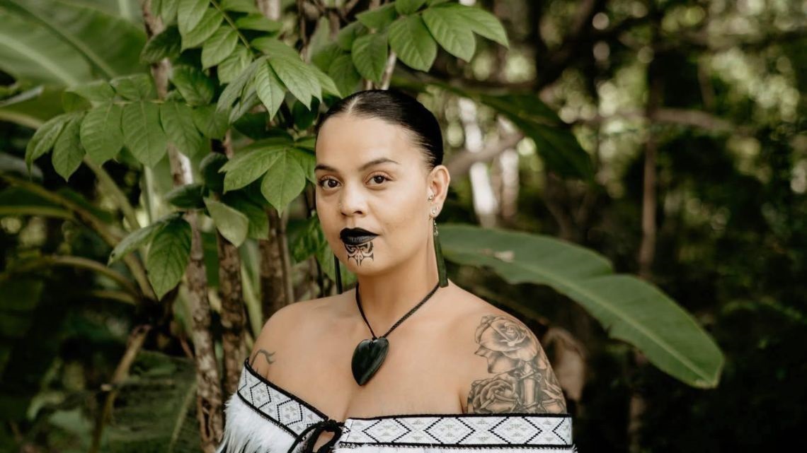 Portrait of woman with traditional face tattoos