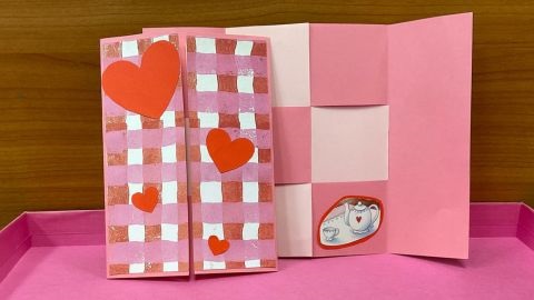 Pink card with weaving feature