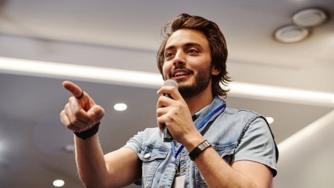 Young man performing with microphone