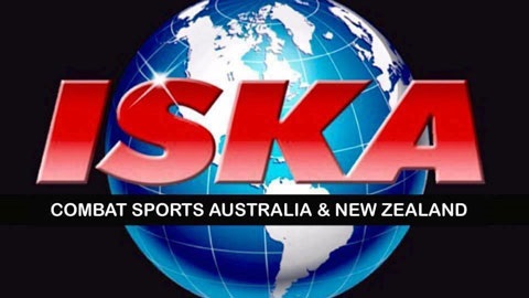 Graphic image with black background and a image of the world. ISKA Combat Sports Australia and New Zealand is written over the world image. 