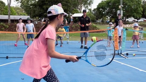 Children playing tennis