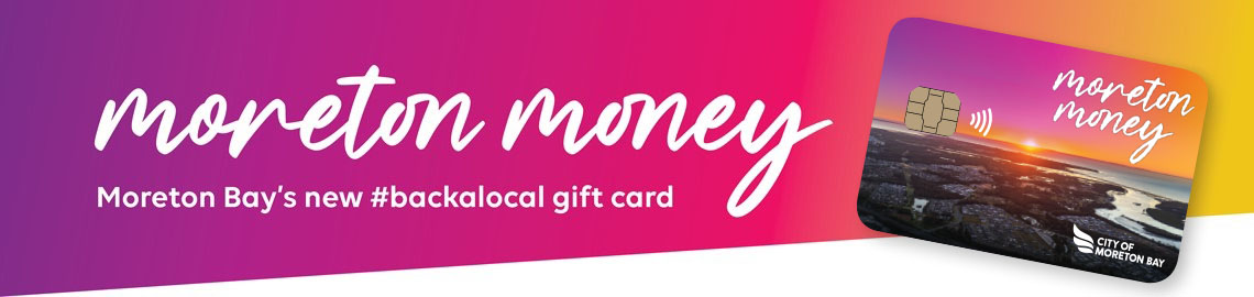 Moreton Money is written in cursive against a pink backdrop. To the right is an example of a moreton money gift card.