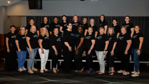 Image of a group of women known as Northside Soul Sisters standing in 2 rows