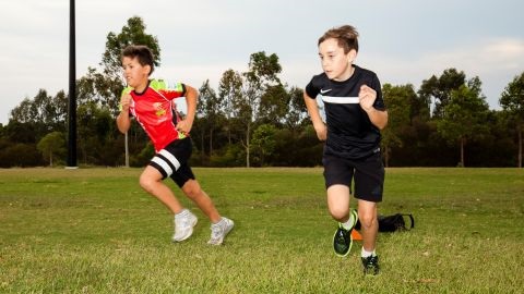 Boys running on sport field.jpg